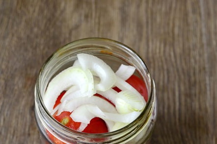 jar filled with tomatoes and onions