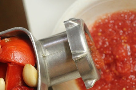 grind vegetables through a meat grinder