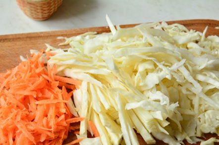 chop cabbage and carrots